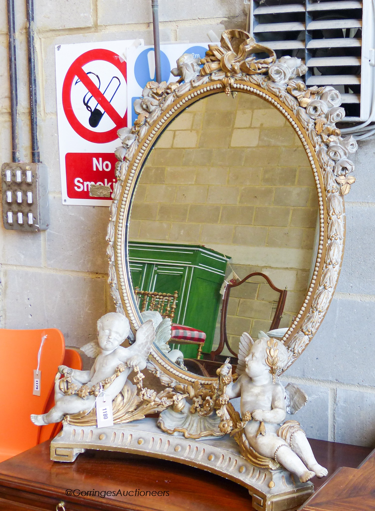 A late 19th century Louis XV style giltwood and gesso painted toilet mirror, width 76cm, height 100cm